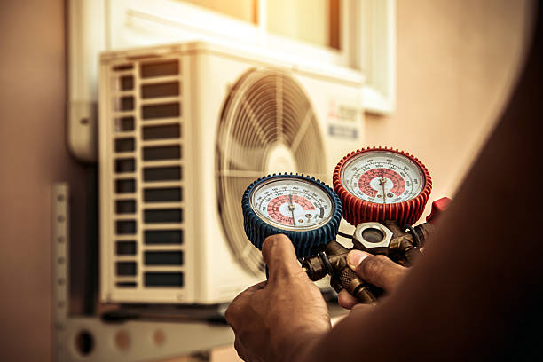 Professional Hvac technician working in Newton, MA